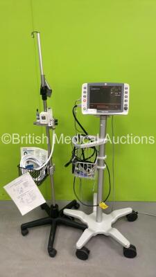 1 x GE Dash 4000 Patient Monitor on Stand (Powers Up) and 1 x Regulator on Stand