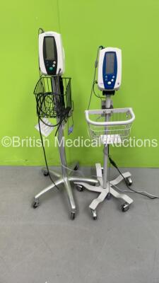 2 x Welch Allyn Spot Vital Signs Monitors on Stands with 2 x AC Power Supplies (Both Power Up) *SN 200802955, 200615499*