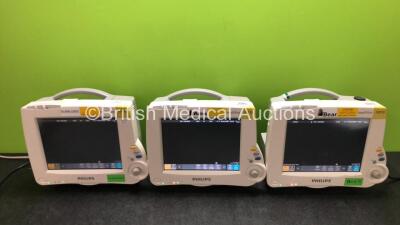 3 x Philips IntelliVue MP30 Patient Monitors (All Power Up, 1 x Slight Damage to Screen, 1 x Slight Damage to Power Button - See Photos) *SN DE62230402 / DE728A1360 / DE72879220*