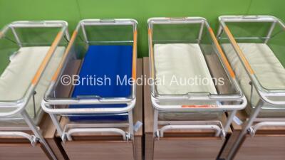 4 x Infant Cots with 4 x Mattresses On Huntleigh Trolleys *Stock Photo Used* *W*