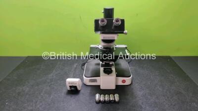 Leitz Benchtop Microscope with 2 x 10 x Lens (Untested Due to No Power Supply) and 5 x Optics Including 1 x 170 / 0.17 NPL40 / 0.65, 1 x EF 10 / 0.25, 1 x PL FLUOTAR 6.3 / 0.20. 1 x PL APO 6.3 / 0.20, 1 x PL 25 / 0.50 *w*