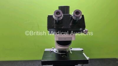 Leitz Benchtop Microscope with 2 x 10 x Lens (Untested Due to No Power Supply) and 5 x Optics Including 1 x 170 / 0.17 NPL40 / 0.65, 1 x EF 10 / 0.25, 1 x PL FLUOTAR 6.3 / 0.20. 1 x PL APO 6.3 / 0.20, 1 x PL 25 / 0.50 *w* - 3