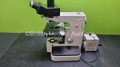 Leitz Benchtop Microscope with 2 x 10 x Lens (Untested Due to No Power Supply) and 5 x Optics Including 1 x 170 / 0.17 NPL40 / 0.65, 1 x EF 10 / 0.25, 1 x PL FLUOTAR 6.3 / 0.20. 1 x PL APO 6.3 / 0.20, 1 x PL 25 / 0.50 *w* - 7