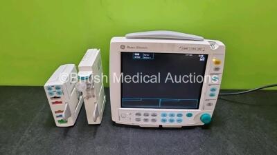 GE Datex-Ohmeda F-FM-01 Patient Monitor (Powers Up) with 1 x GE Type N-FC-00 Module with Mini D-fend Water Trap and 1 x GE PSMPW Module Including ECG, SpO2, NIBP, P1, P2, T1 and T2 Options (Powers Up)