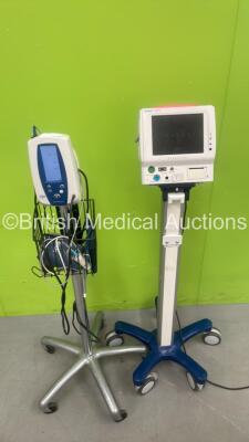 1 x Welch Allyn SPOT Vital Signs Monitor on Stand (Powers Up) and 1 x Fukuda Denshi DS-7100 Patient Monitor (Draws Power - Blank Screen)