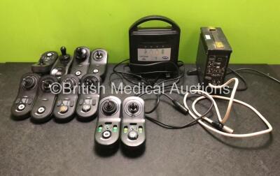 Job Lot Including 10 x Dynamic Controls Wheelchair Controllers (All Missing Casing - See Photos) and 2 x Invacare Wheelchair Chargers (1 x Powers Up, 1 x Untested Due to Foreign Plug)