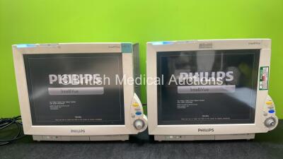 2 x Philips IntelliVue MP70 Patient Monitors (Both Power Up, 1 with Missing Dial and Tag-See Photo) *SN DE843B3674, DE843B4010*