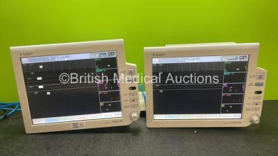 2 x Fukuda Denshi DS-8000 System Patient Monitors with 2 x Monitor Arms (Both Power Up) *SN 50100041, 50100037*