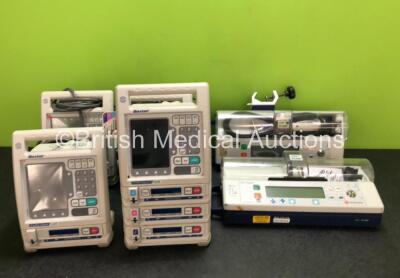 Job Lot Including 5 x IVAC PCAM Syringe Pumps (2 in Photo, 5 in Total) and 14 x Baxter Pumps (4 in Photo, 14 in Total) *in cage*