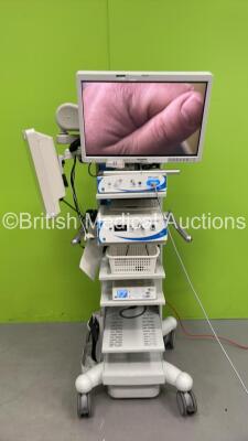 ConMed Stack System with Olympus OEV621H Monitor, ConMed Linvatec 1080P HD Camera Control Unit, ConMed Linvatec IM4120 True HD 1080P Camera Head, ConMed Linvatec Xenon 300 Watt Light Source and Medicapture MediCap USB 300 Medical Video Recorder (Powers Up