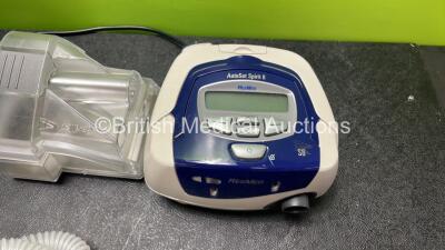 Job Lot Including 1 x ResMed Airsense 10 CPAP Unit with 2 x AC Power Supplies, 1 x Spare Humidifier Unit, 1 x Breathing Mask, Tubing and User Guide (Powers Up with Missing Tag-See Photo) 1 x ResMed Autoset Spirit II CPAP Unit (No Power) *SN 23182126128, 2 - 3