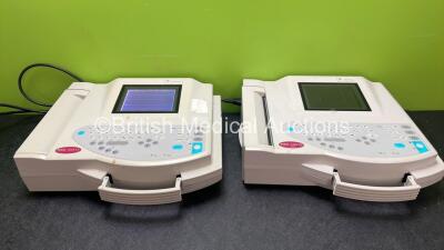 2 x GE MAC 1200ST ECG Machines (Both Power Up, 1 with Blank Display-See Photo) *SN 550047792, 550003640*