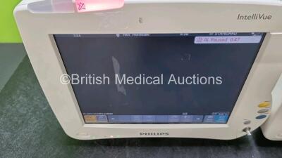 Job Lot Including 2 x Philips IntelliVue MP50 Patient Monitors (Both Power Up 1 x with Damage to Casing and Both with Scratching On Screen - See Photos ) and 2 x Philips IntelliVue X2 Handheld Patient Monitors Including ECG, SpO2, NBP, Press and Temp Opti - 4