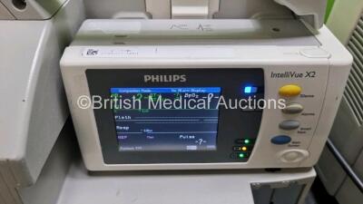 Job Lot Including 2 x Philips IntelliVue MP30 Patient Monitors (Both Power Up Both with Damage To Casing - See Photo) and 2 x Philips IntelliVue X2 Handheld Patient Monitors Including ECG, SpO2, NBP, Press and Temp Options (Both Power Up) *SN DE72850368 / - 7