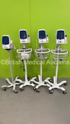 4 x Welch Allyn Spot VItal Signs LXi Patient Monitors on Stands with Selection of Cables (All Power Up)