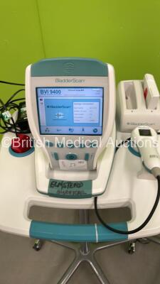 2 x Verathon BVI 9400 Bladder Scanners with 2 x Transducers, 2 x Battery Chargers and 4 x Batteries (Both Power Up) *S/N B4012678 / B4020913* - 4