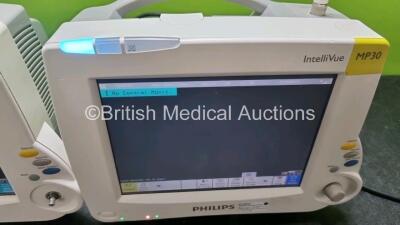 Job Lot Including 2 x Philips IntelliVue MP30 Patient Monitors (Both Power Up 1 x Missing Dial) and 2 x Philips IntelliVue X2 Handheld Patient Monitors Including ECG, SpO2, NBP, Press and Temp Options (Both Power Up) *SN DE03766612 / DE37607623 / DE728873 - 2