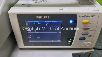 Job Lot Including 2 x Philips IntelliVue MP30 Patient Monitors (Both Power Up 1 x Missing Dial) and 2 x Philips IntelliVue X2 Handheld Patient Monitors Including ECG, SpO2, NBP, Press and Temp Options (Both Power Up) *SN DE03766612 / DE37607623 / DE728873 - 7