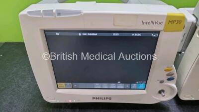 Job Lot Including 2 x Philips IntelliVue MP30 Patient Monitors (Both Power Up Both with Damage To Casing - See Photo) and 2 x Philips IntelliVue X2 Handheld Patient Monitors Including ECG, SpO2, NBP, Press and Temp Options (Both Power Up) *SN DE72870719 / - 3