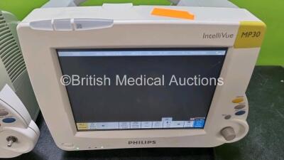 Job Lot Including 2 x Philips IntelliVue MP30 Patient Monitors (Both Power Up Both with Damage To Casing - See Photo) and 2 x Philips IntelliVue X2 Handheld Patient Monitors Including ECG, SpO2, NBP, Press and Temp Options (Both Power Up) *SN DE72870719 / - 4