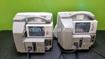 Job Lot Including 2 x Philips IntelliVue MP30 Patient Monitors (Both Power Up Both with Damage To Casing - See Photo) and 2 x Philips IntelliVue X2 Handheld Patient Monitors Including ECG, SpO2, NBP, Press and Temp Options (Both Power Up) *SN DE72870719 / - 7