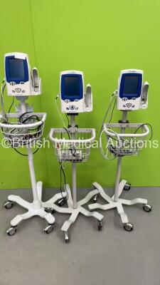 3 x Welch Allyn Spot VItal Signs LXi Patient Monitors on Stands with Selection of Cables (All Power Up)