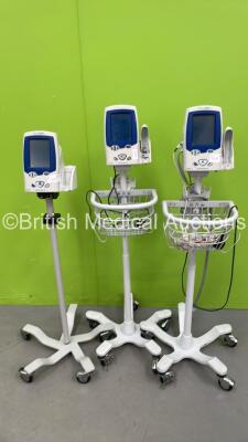 3 x Welch Allyn Spot VItal Signs LXi Patient Monitors on Stands with Selection of Cables (2 x Power Up - 1 x No Power)