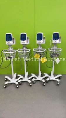 4 x Welch Allyn Spot VItal Signs LXi Patient Monitors on Stands with Selection of Cables (All Power Up)