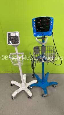 1 x GE Dinamap Carescape V100 Vital Signs Monitor on Strand and 1 x Welch Allyn Blood Pressure Meter on Stand (Powers Up)