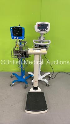 1 x GE Dinamap Carescape V100 Vital Signs Monitor on Stand (Error Displayed - See Pictures), 1 x Welch Allyn 53N00 Vital Signs Monitor on Stand (Both Power Up) and 1 x Seca Stand on Scales