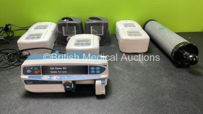 Mixed Lot Including 1 x CareFusion Alaris GH Pump (Powers Up with Fault-See Photo) 2 x Fisher & Paykel ICON+ Novo CPAP Units (1 Powers Up, 1 No Power) 4 x DeVilbiss Sleep Cubes (4 Power Up, 1 No Power) 1 x Calibration Syringe *SN 800290861, IK002746, IK00