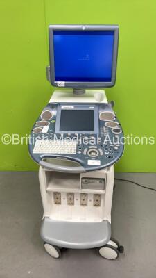 GE Voluson E8 Expert Flat Screen Ultrasound Scanner *S/N D15421* **Mfd 11/2011** Software Version 12.0.0.504 with Mitsubishi P95 Printer (Powers Up - Missing Keys - Slight Damage - See Pictures) ***IR968***