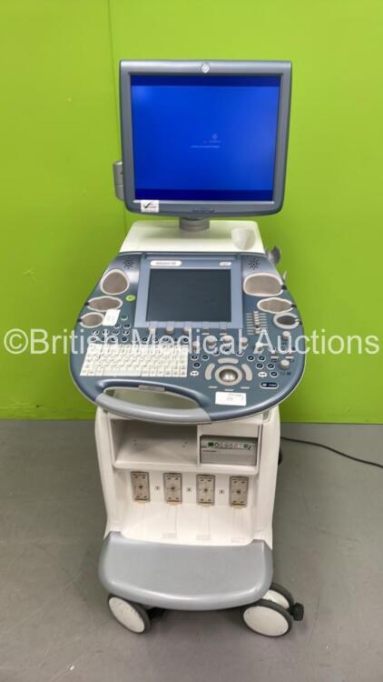 GE Voluson E8 Expert Flat Screen Ultrasound Scanner *S/N D15421* **Mfd 11/2011** Software Version 12.0.0.504 with Mitsubishi P95 Printer (Powers Up - Missing Keys - Slight Damage - See Pictures) ***IR968***