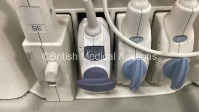 GE Vivid 7 Ultrasound Scanner *S/N 5330V7* **Mfd 01/2004** with 4 x Transducers / Probes (M5S-D Ref GE-3MIX *Mfd 2009* / 3S *Mfd 01/2007* / 8C *Mfd 2013* and 8C *Mfd 2010*) (Powers Up - HDD Removed) - 5