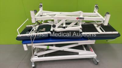 1 x Bristol Maid Electric Patient Couch with Controller (Powers Up) and 1 x Medi Plinth Hydraulic Patient Examination Couch (Hydraulics Tested Working) *S/N 584018*