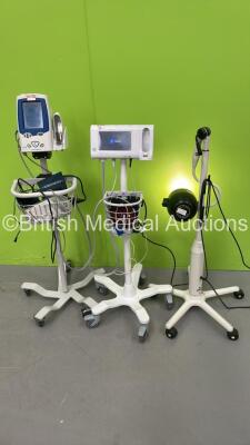 1 x Welch Allyn Spot Vital Signs LXi Monitor on Stand with Leads, 1 x Welch Allyn Connex Spot Monitor and 1 x Daray Patient Examination Lamp on Stand (Powers Up - Good Bulb)