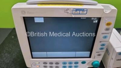 2 x GE Datex Ohmeda FM Patient Monitors (Both Power Up) with 1 x GE E-PSMP-00 Module Including ECG, SpO2, NIBP, T1, T2, P1 and P2 Options and 1 x *SN GE E-PSM-00 Module Including ECG, SpO2, NIBP, T1 and T2 Options *SN 6378504 / 65337522 / 6383796 / 649466 - 4