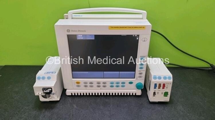 GE Datex Ohmeda F-CM1-04 Anaesthesia Monitor Including (Powers Up) 1 x E-PRESTN-00 Module with ECG, SpO2, NIBP, T1, T2, P1 and P2 Options and 1 x GE Gas Module Type E-CAi0V-00 with Spirometry Options and D-Fend Water Trap *SN 6379368 / 6133955 / 64443172*