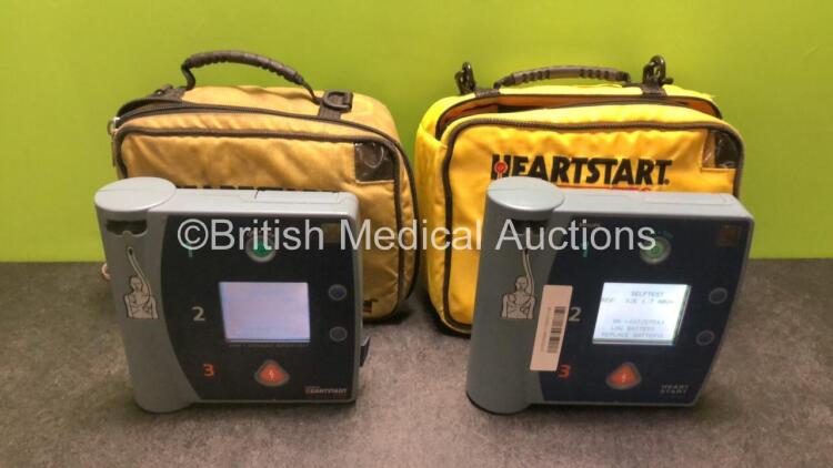 Job Lot Including 1 x Laerdal Heartstart FR2 Defibrillator and 1 x Philips Heartstart FR2+ Defibrillator in 2 x Carry Cases (Both Power Up with Stock Battery, Battery Not Included, 1 x Case Zip Broken) *SN 1002073351 / 1007257583*