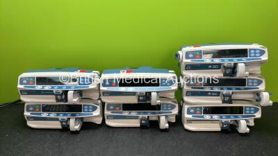 Job Lot of Infusion Pumps Including 2 x Carefusion Alaris GH Guardrails Plus Infusion Pumps (Both Power Up) 2 x Carefusion Alaris Plus GH Infusion Pumps (Both Power Up) 1 x Cardinal Health Alaris GH Pump (Powers Up with Required Service Message) 2 x Alari