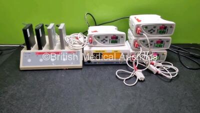 Job Lot Including 4 x Masimo Radical 7 Signal Extraction Pulse CO-Oximeters (All Power Up) with 4 x SpO2 Finger Sensor Connectors 1 x Datex Ohmeda 3800 Oximeter (Powers Up) and 1 x LG1480 Charger Station with 4 x Batteries (Powers Up)