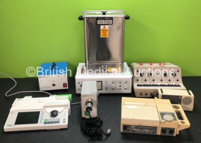 Mixed Lot Including 1 x Seward Medical 19.5113 75 Watt Light Source, 1 x Fresenius Kabi Orchestra Base Primea Docking Station, 1 x Olympus MU-1 Leakage Tester (Powers Up) 1 x EMS Medi-Link Control Module (Powers Up with Errors) 1 x Chattanooga E-1 Hydroco