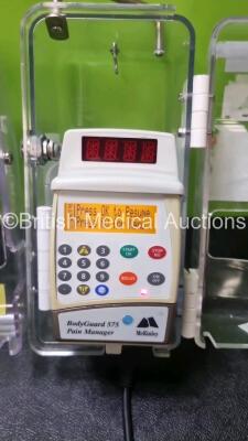 Job Lot Including 3 x CME Medical Bodyguard 575 Infusion Pumps with Casing, 1 x McKinley Bodyguard 575 Infusion Pump with Casing and 3 x Spare Cases (1 x No Power) - 5