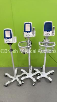 3 x Welch Allyn Spot VItal Signs LXi Patient Monitors on Stands with Selection of Cables (2 x Power Up - 1 x No Power)