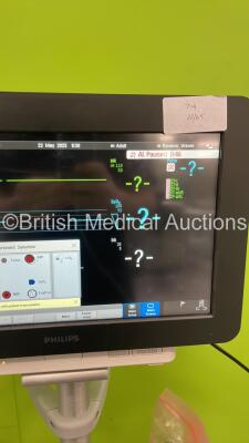 Philips MX550 Patient Monitor on Stand with Philips 867041 CO2 Module with Microstream Option, Philips 867036 Multiparameter Module with Temp, Press, SPO2, NBP and ECG/Resp Options, SPO2 Finger Sensor and 3 Lead ECG Leads (Powers Up) *S/N DE69530860 / DE6 - 5