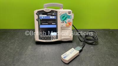 Philips MRx Defibrillator Including ECG and Printer Options with 1 x Paddle Lead, 1 x 50 Ohm Test Load, 1 x Philips M3539A Battery and 1 x Philips M3538A Module (Powers Up) *SN US00584769*