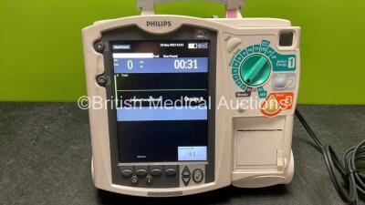 Philips MRx Defibrillator Including ECG and Printer Options with 1 x Paddle Lead, 1 x 50 Ohm Test Load, 1 x Philips M3539A Battery and 1 x Philips M3538A Module (Powers Up) *SN US00584769* - 2