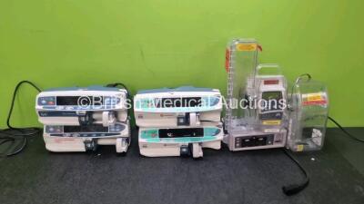 Mixed Lot Including 2 x Alaris Carefusion Alaris GH Syringe Pumps (1 x No Power) 2 x Carefusion Alaris PK Syringe Pumps (Both Power Up) 1 x CME Mckinley BodyGuard 545 Pump (Powers Up) with 2 x Cases and 1 x Nellcor N-560 Pulse Oximeter