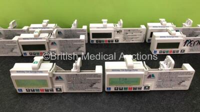 9 x CME Medical T34 Ambulatory Syringe Pumps (All Power Up with Stock Battery, Batteries Not Included, 3 x Missing Battery Covers, 1 x Damaged Casing - See Photos) *SN 18686 / S49292 / S55270 / 18742 / 18914 / 18704 / 18970 / S09764 / 18892* - 3