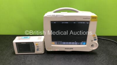 Philips IntelliVue MP30 Patient Monitor (Powers Up with Damage to Casing / Screen and Missing Dial - See Photos) with 1 x Philips IntelliVue X2 Handheld Patient Monitor Including ECG, SpO2, NBP, Temp and Press Options (Powers Up)